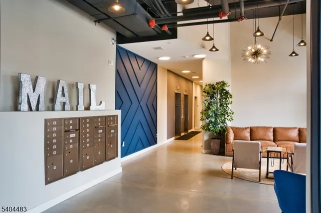 a kitchen with sink cabinets and wooden floor
