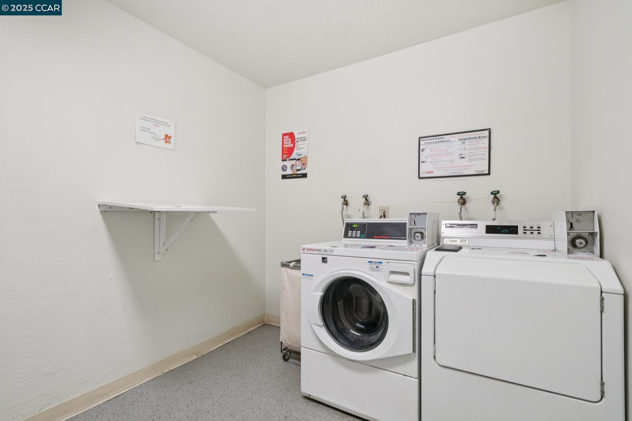 150 Pearl Street, Unit 122 Oakland, CA 94611 - Photo 25 of 34 a utility room with dryer and washer