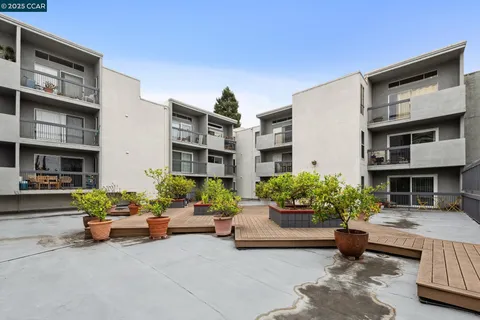 a building outdoor space with potted plants