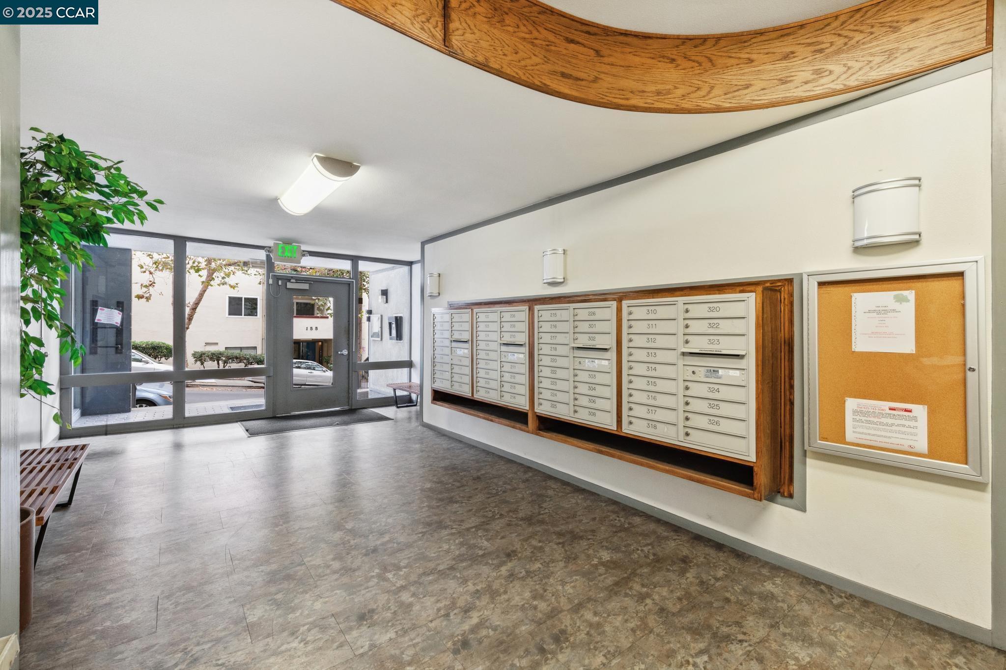 150 Pearl Street, Unit 122 Oakland, CA 94611 - Photo 34 of 34 a view of an empty room with wooden floor and a window