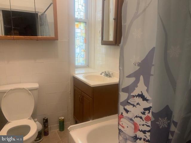 5630 Walnut Street, Unit 2 Philadelphia, PA 19139 - Photo 7 of 28 a bathroom with a sink toilet and shower