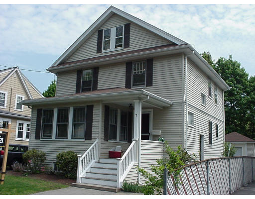 7 Spencer Street Lexington, MA 02420 - Photo 1 of 1 a front view of a house with a yard