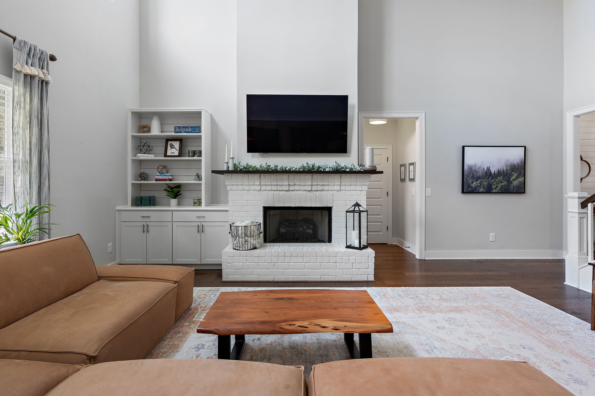315 Colt Avenue Mount Juliet, TN 37122 - Photo 5 of 28 a living room with furniture flat screen tv and a fireplace