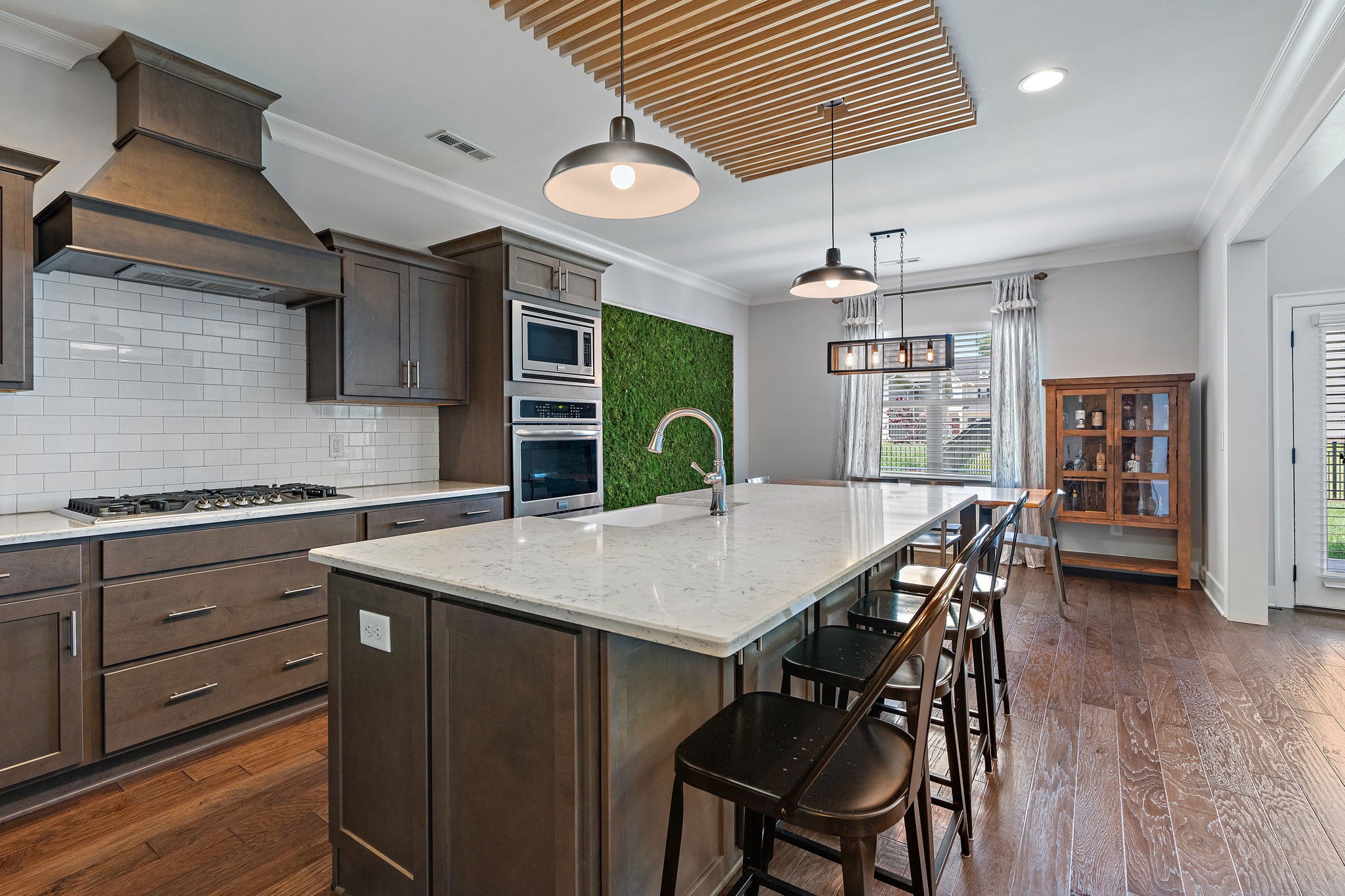 315 Colt Avenue Mount Juliet, TN 37122 - Photo 7 of 28 a kitchen with a table chairs and wooden floor