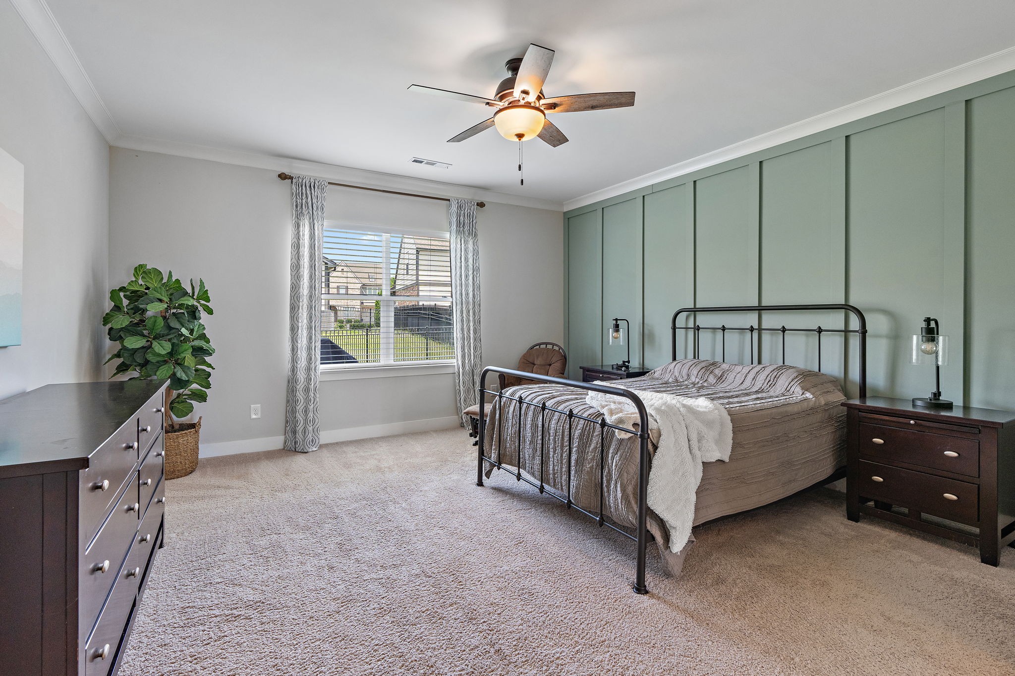 315 Colt Avenue Mount Juliet, TN 37122 - Photo 10 of 28 a spacious bedroom with a bed and a chandelier