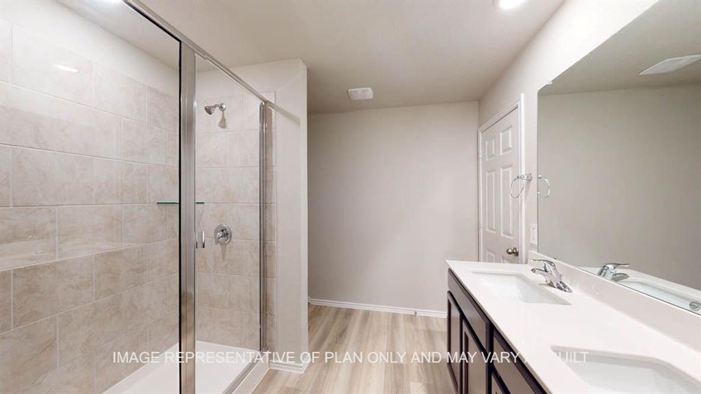 3201 Cyprian Road Lorena, TX 76655 - Photo 20 of 27 a bathroom with a sink and mirror