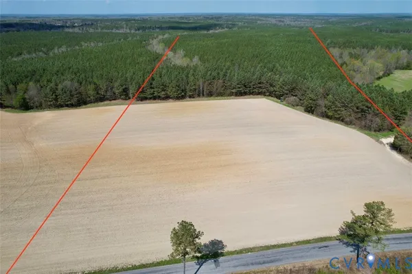 a view of a lake with a yard