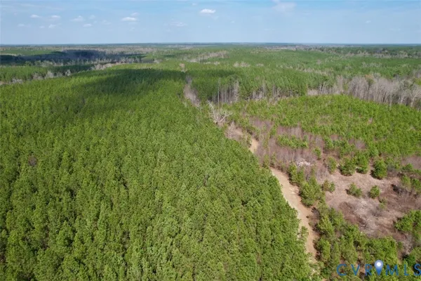 a view of lake with green space