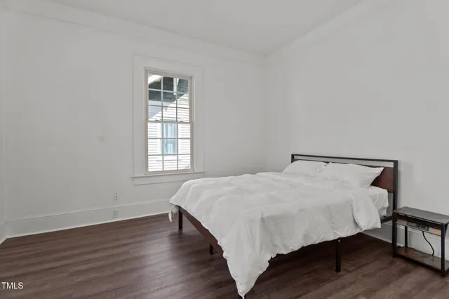 a bathroom with a sink a toilet and a shower
