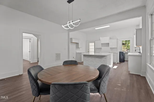 a bathroom with a sink double vanity and a window