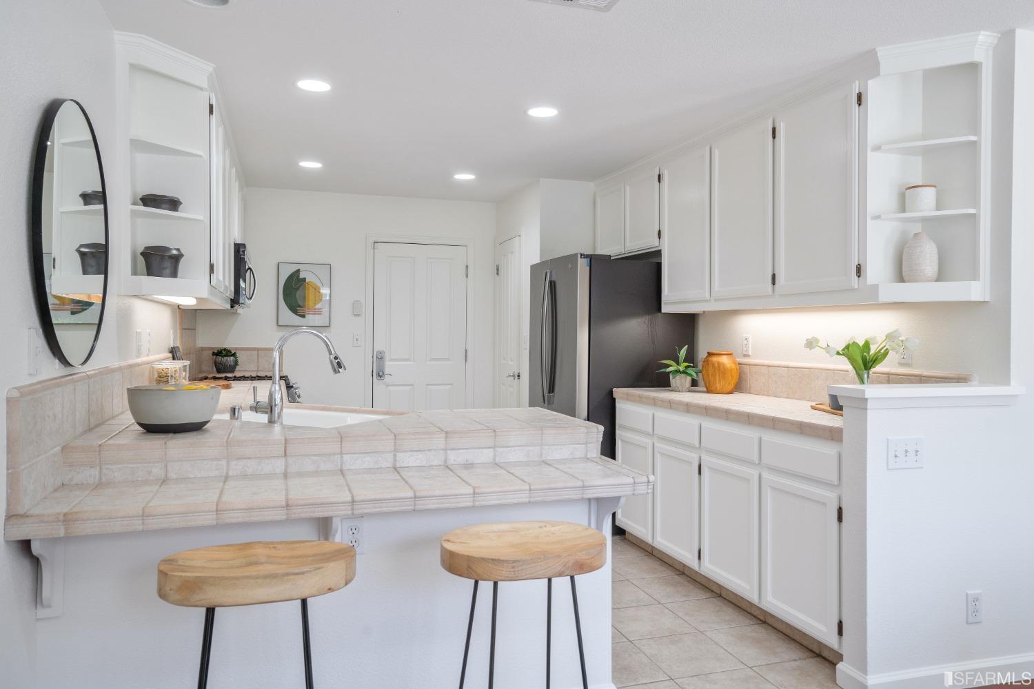 7531 Imperata Lane San Ramon, CA 94582 - Photo 15 of 37 a kitchen with refrigerator and cabinets