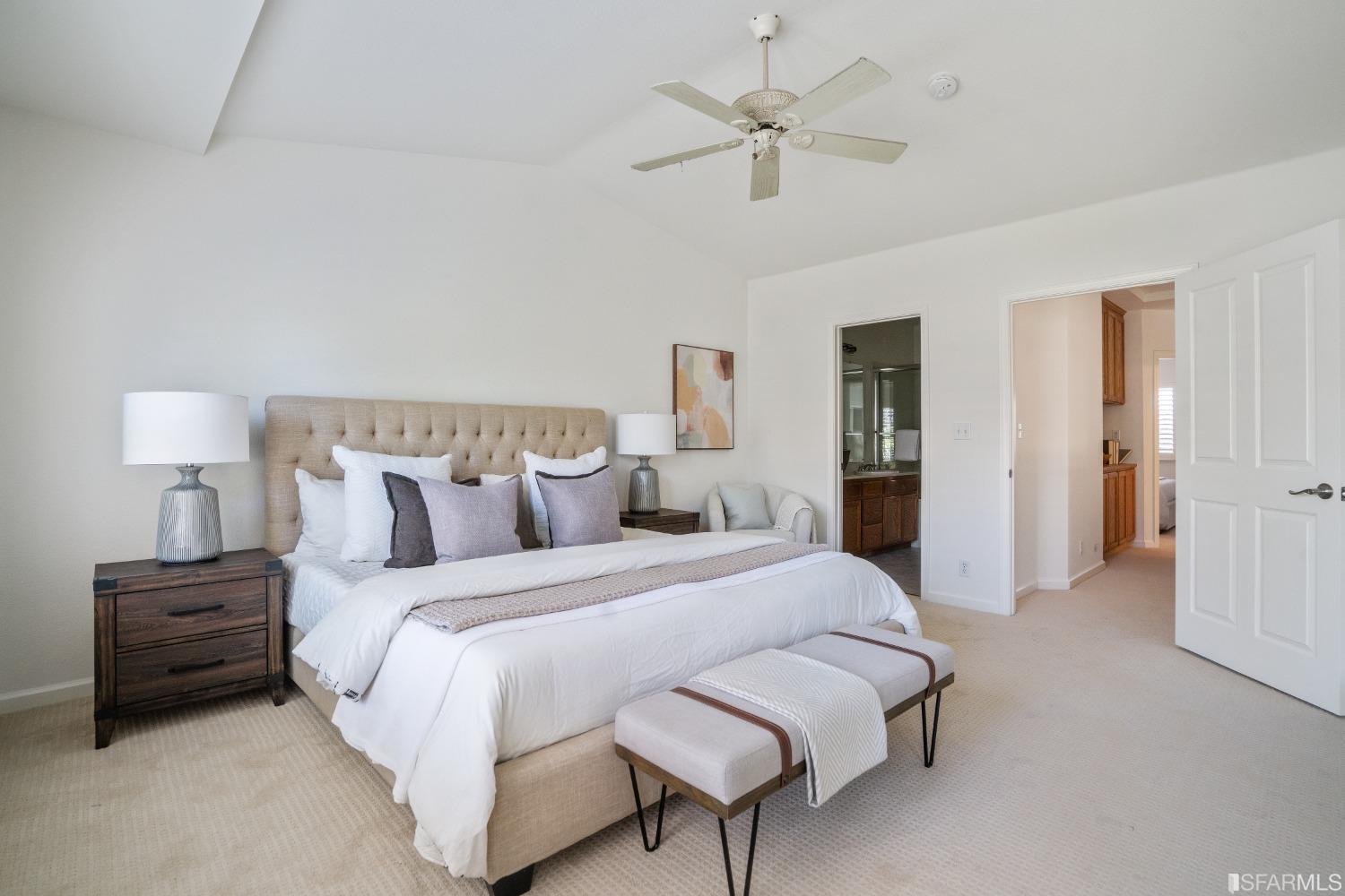 7531 Imperata Lane San Ramon, CA 94582 - Photo 21 of 37 a bedroom with a bed and a chandelier