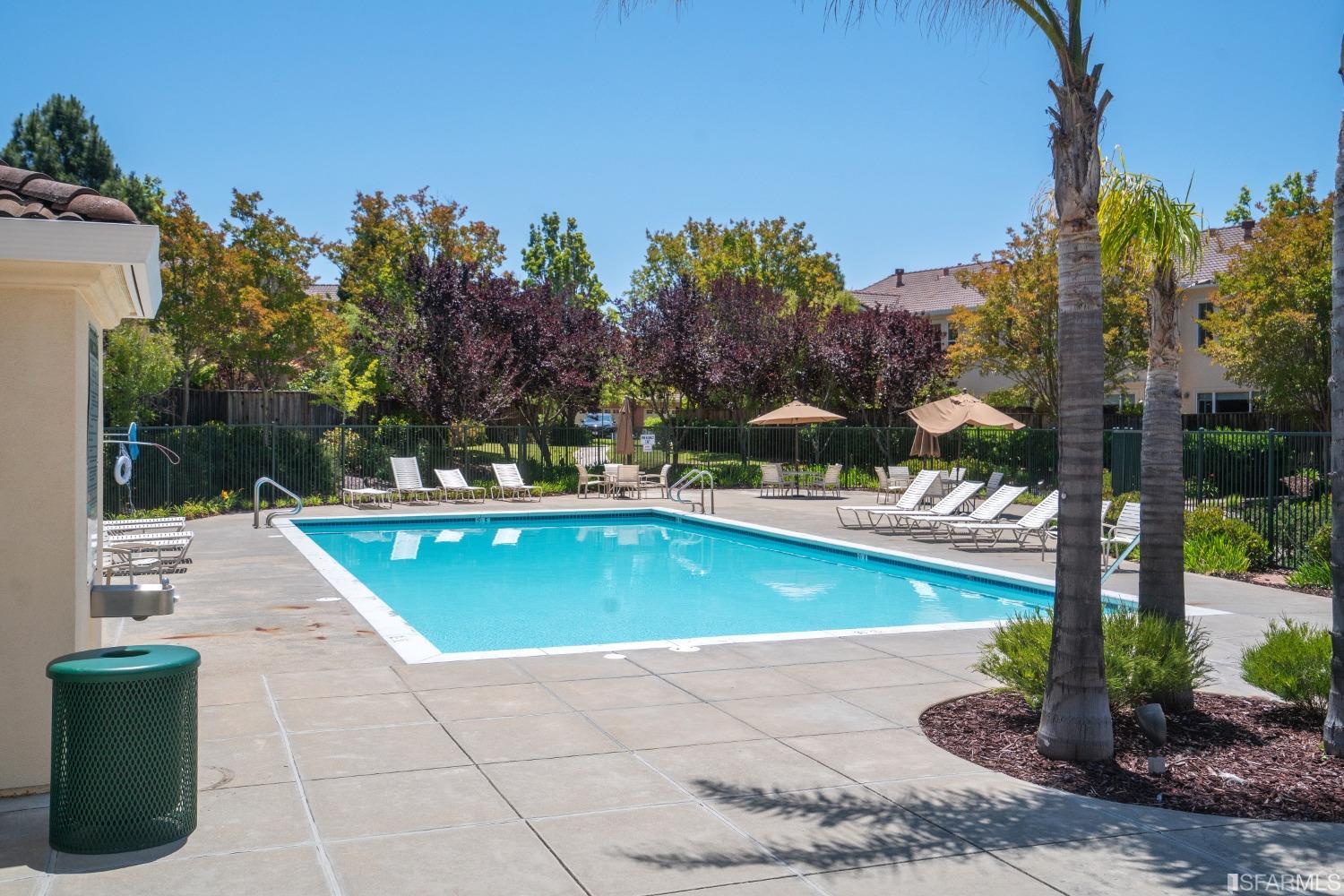 7531 Imperata Lane San Ramon, CA 94582 - Photo 33 of 37 a view of a swimming pool with a patio and a yard