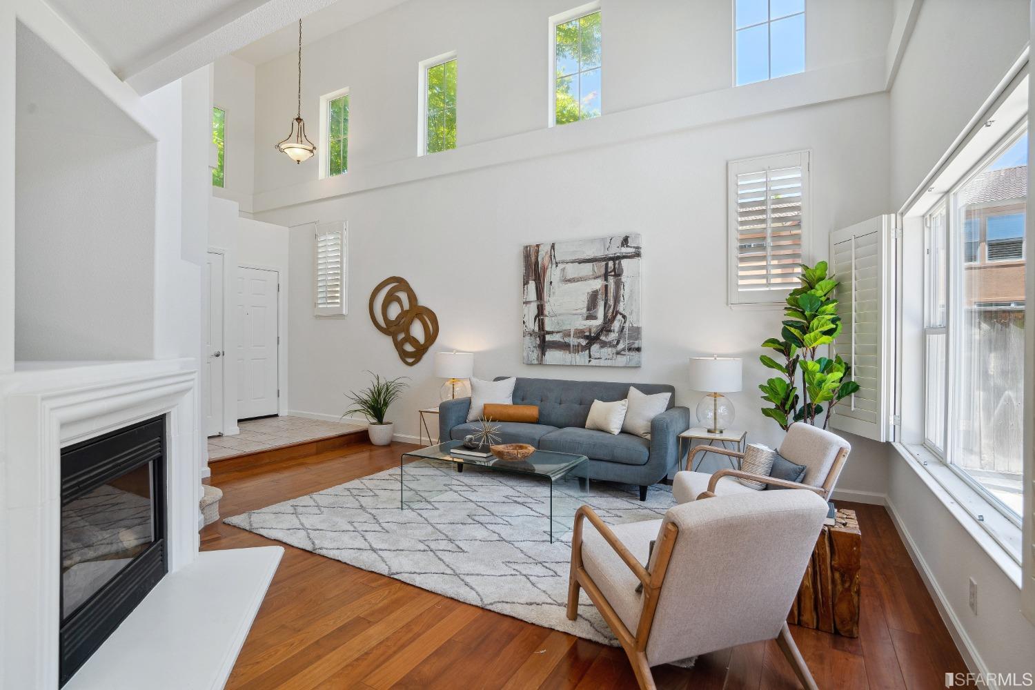 7531 Imperata Lane San Ramon, CA 94582 - Photo 10 of 37 a living room with furniture and a fireplace
