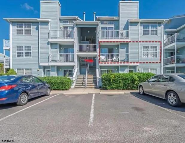 a car parked in front of a building