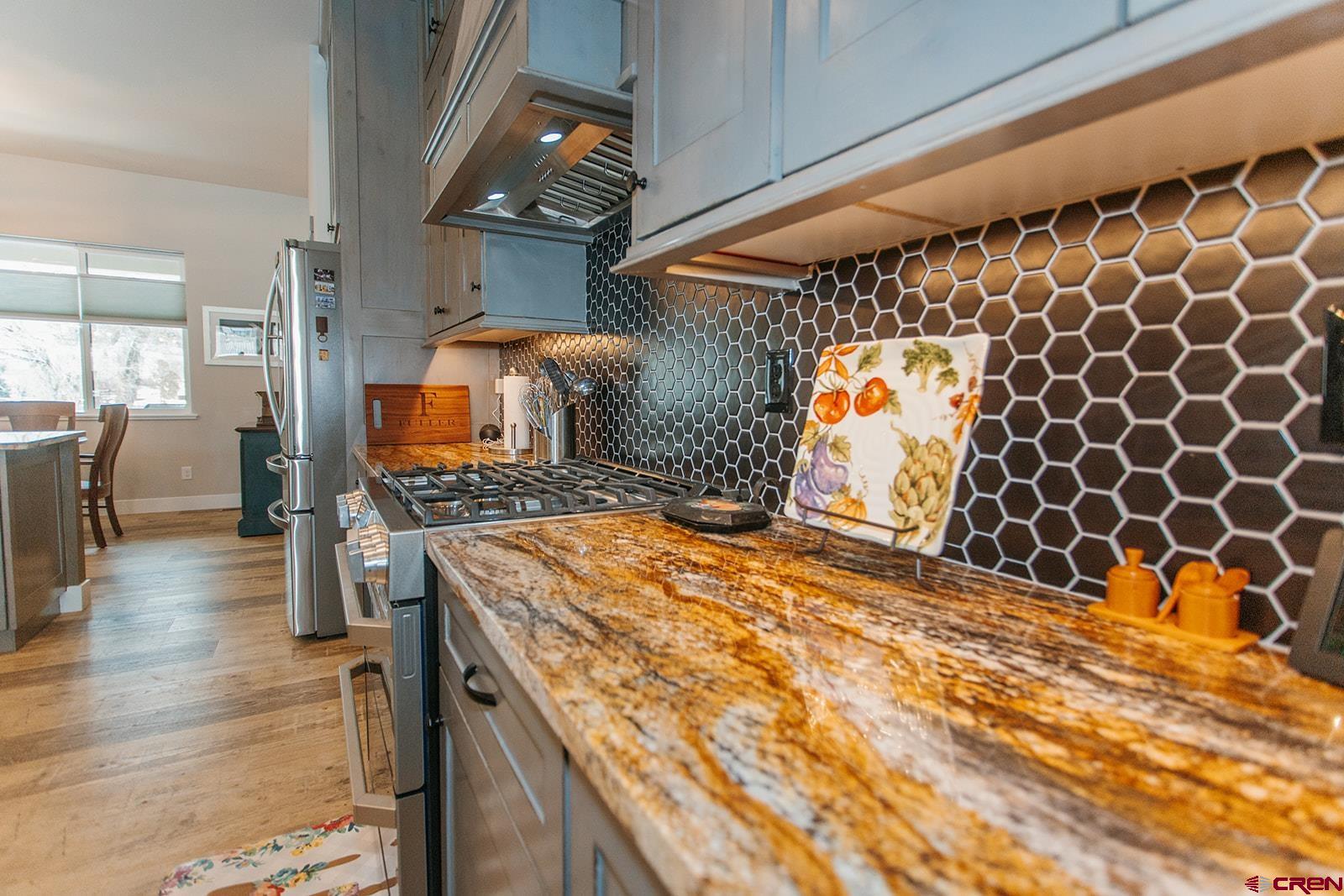 4041 Pioneer Road Montrose, CO 81403 - Photo 13 of 43 a kitchen with a sink and cabinets
