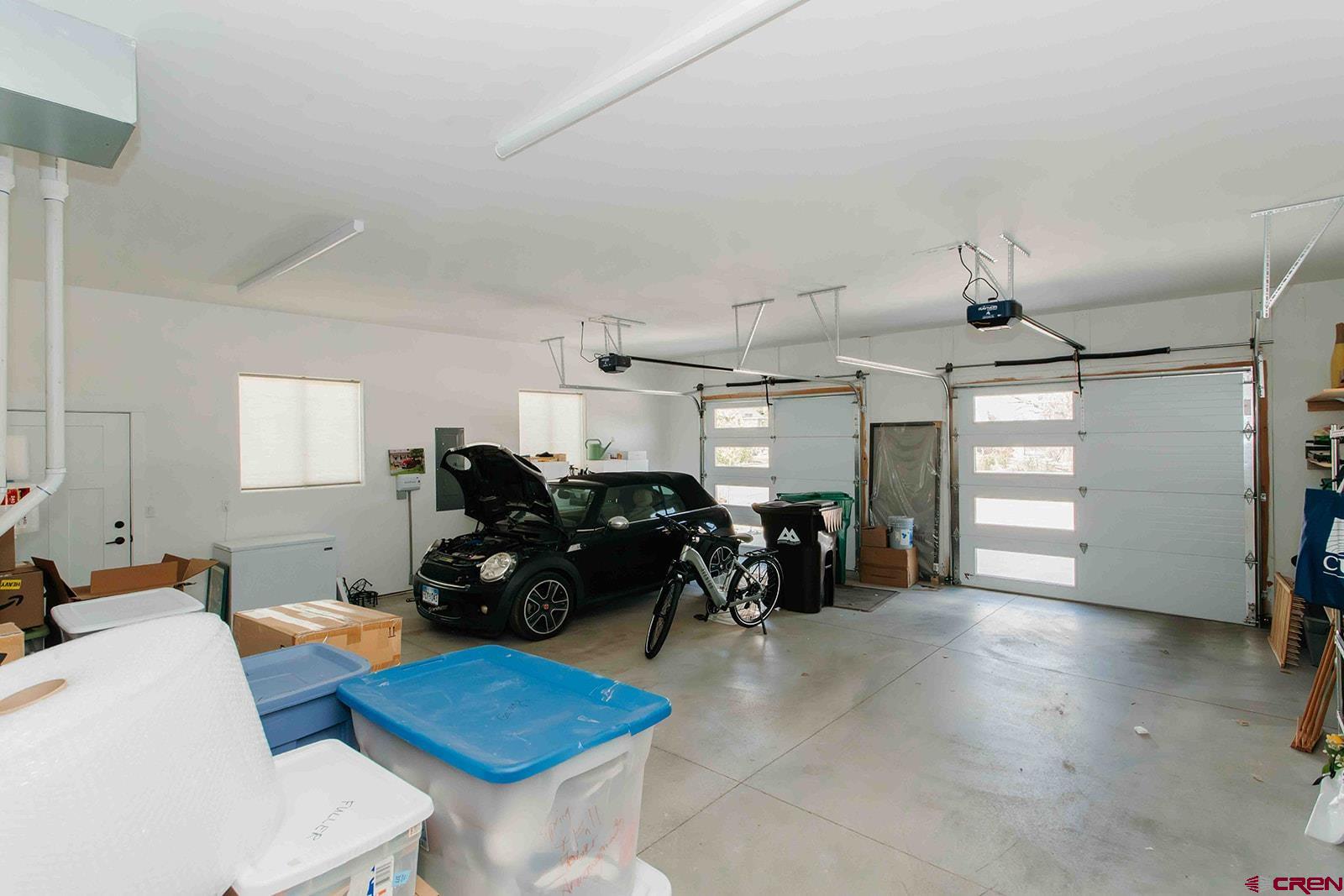 4041 Pioneer Road Montrose, CO 81403 - Photo 28 of 43 a living room with furniture and a window