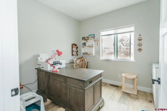 a bathroom with a mirror and a shower