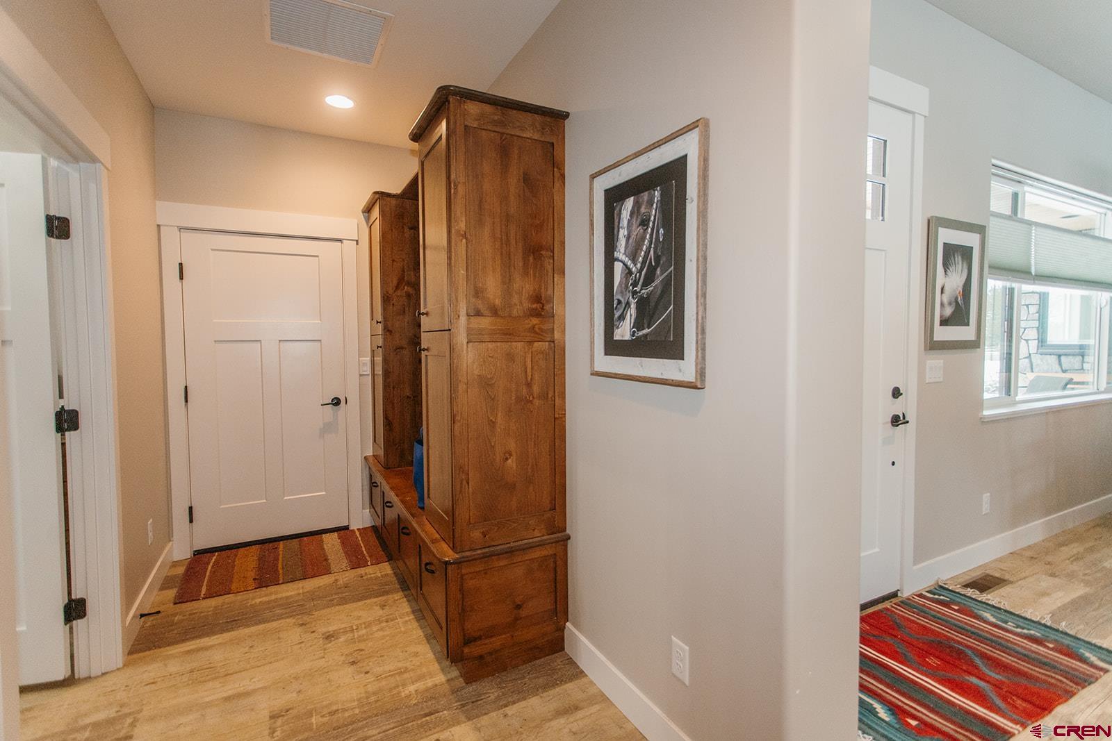 4041 Pioneer Road Montrose, CO 81403 - Photo 31 of 43 a bathroom with a mirror and a shower