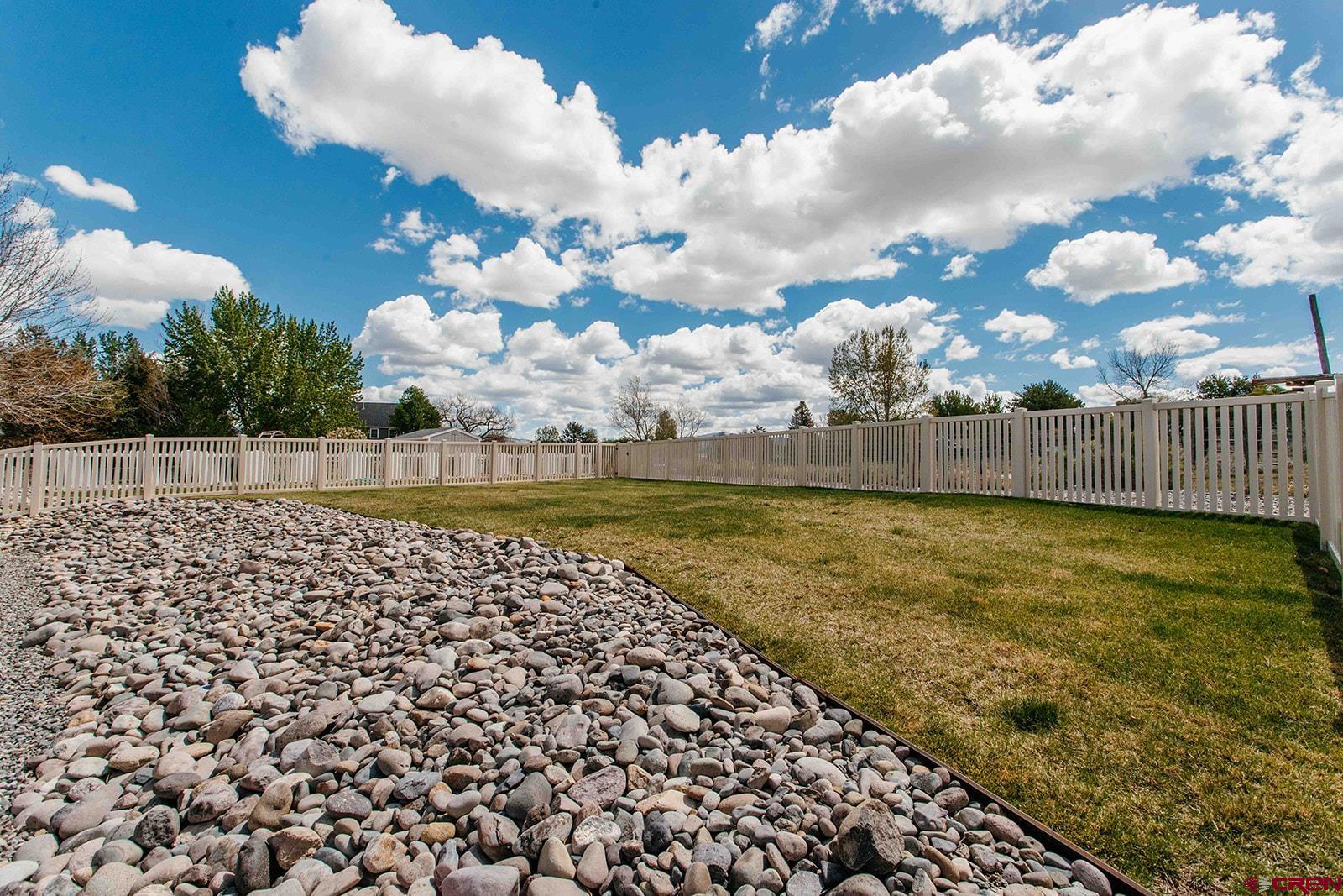 4041 Pioneer Road Montrose, CO 81403 - Photo 31 of 43 a view of a yard