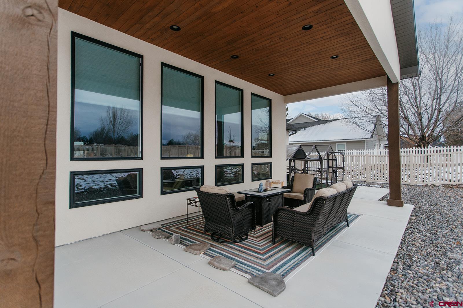 4041 Pioneer Road Montrose, CO 81403 - Photo 34 of 43 a dining room with furniture and wooden floor