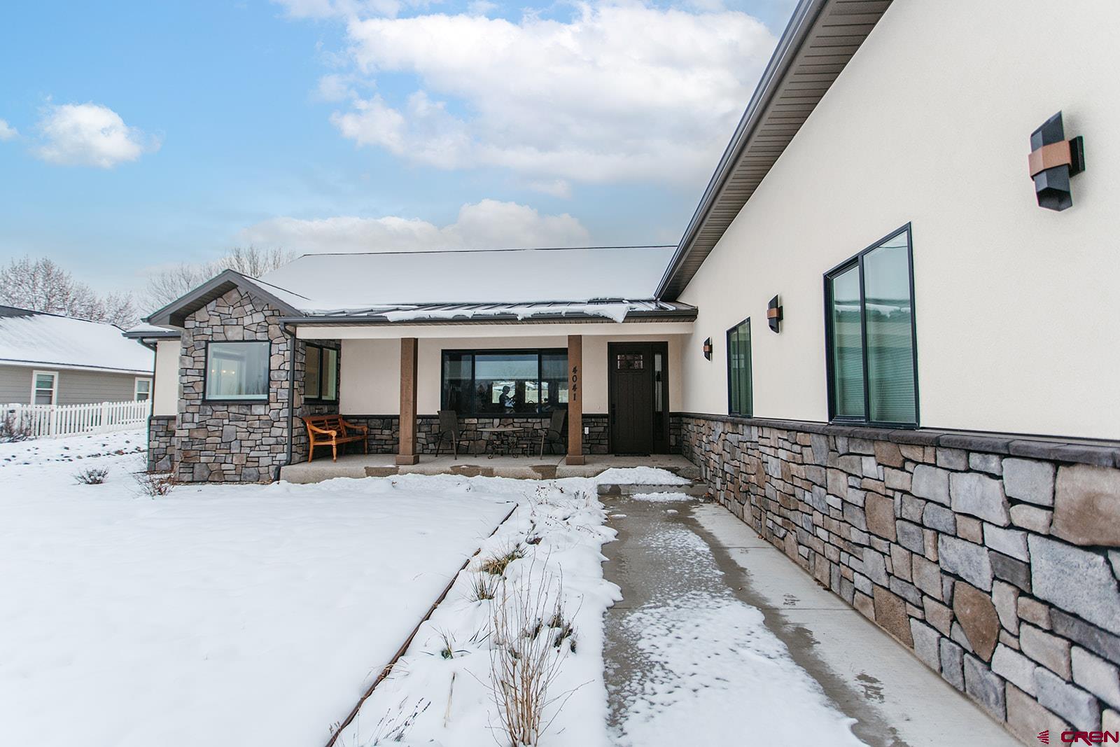 4041 Pioneer Road Montrose, CO 81403 - Photo 35 of 43 a view of living room and kitchen