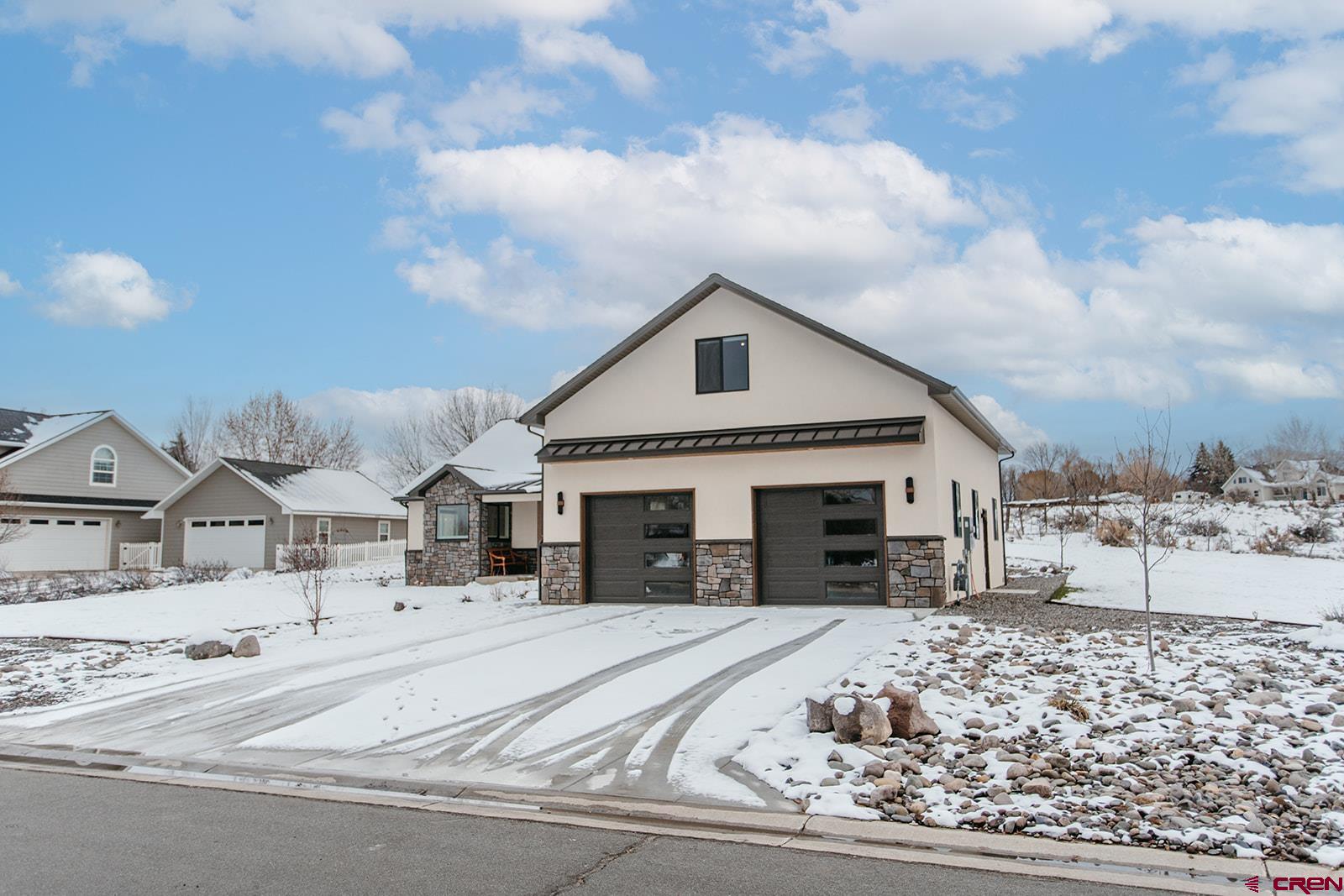 4041 Pioneer Road Montrose, CO 81403 - Photo 36 of 43 a view of a house with a snow in the background
