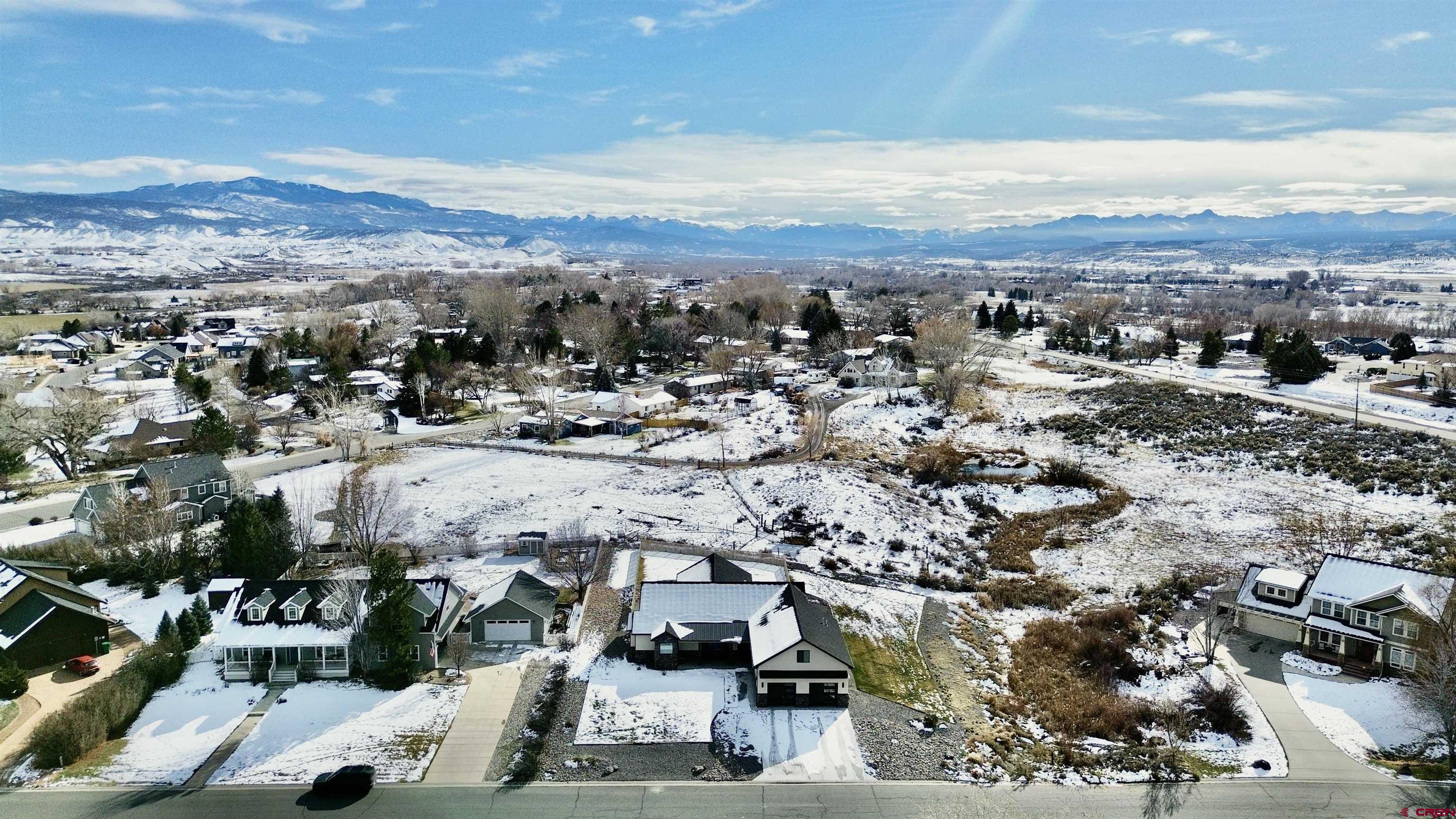 4041 Pioneer Road Montrose, CO 81403 - Photo 42 of 43 an aerial view of residential houses with outdoor space