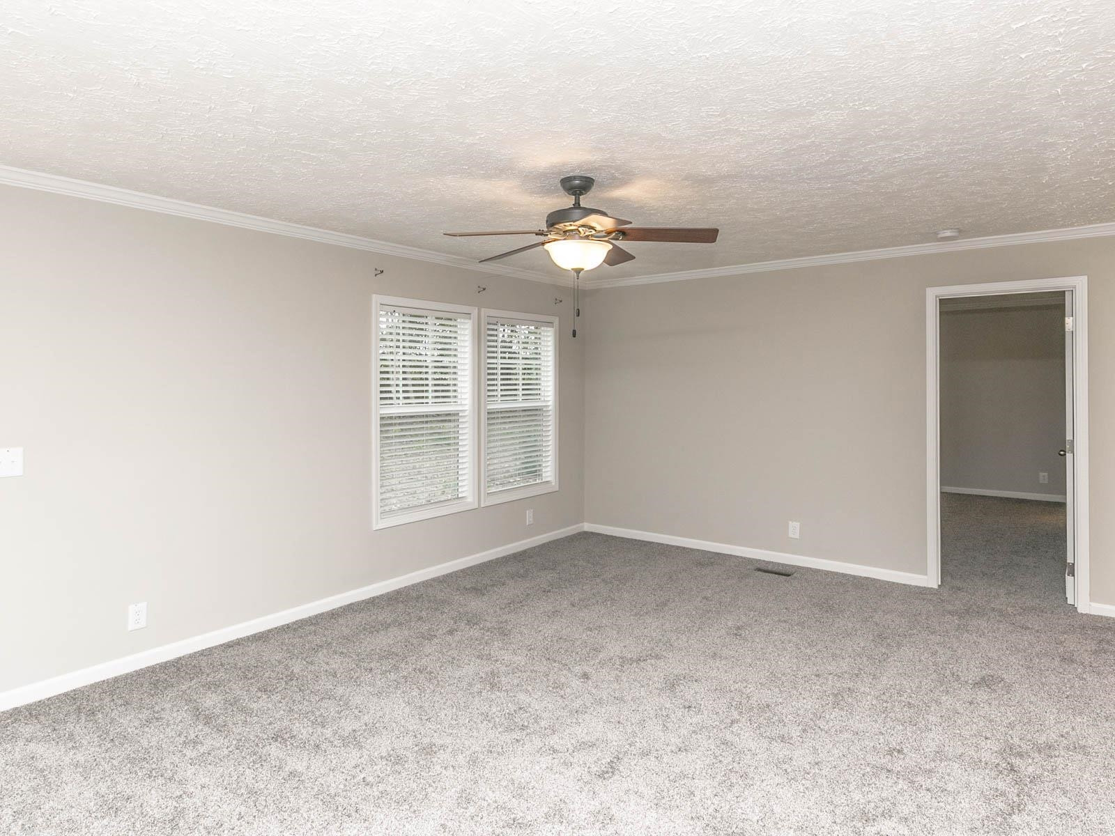 1650 Moulton Road Louisburg, NC 27549 - Photo 6 of 23 a view of an empty room with a window