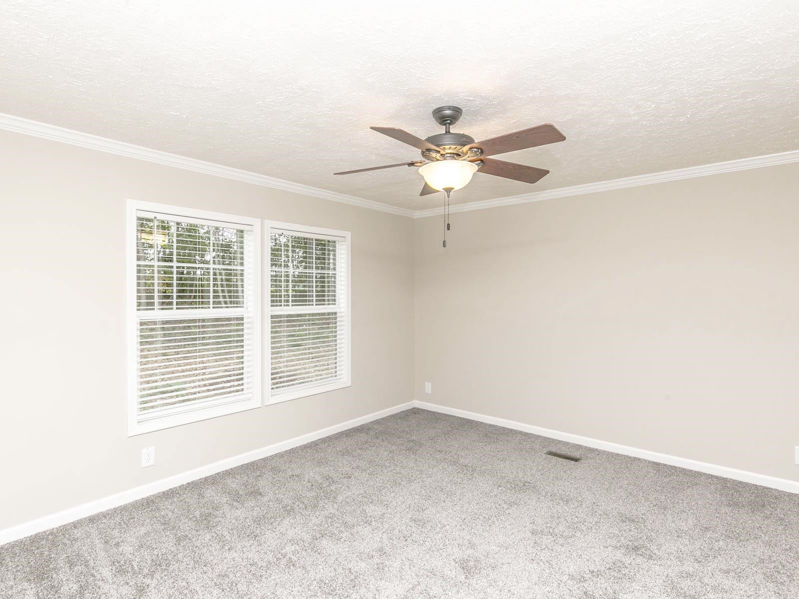 1650 Moulton Road Louisburg, NC 27549 - Photo 8 of 23 an empty room with a window