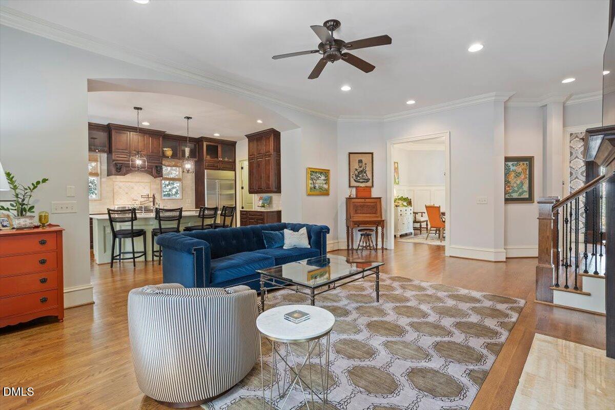 3916 Laurel Manor Court Raleigh, NC 27612 - Photo 10 of 53 a living room with furniture and wooden floor