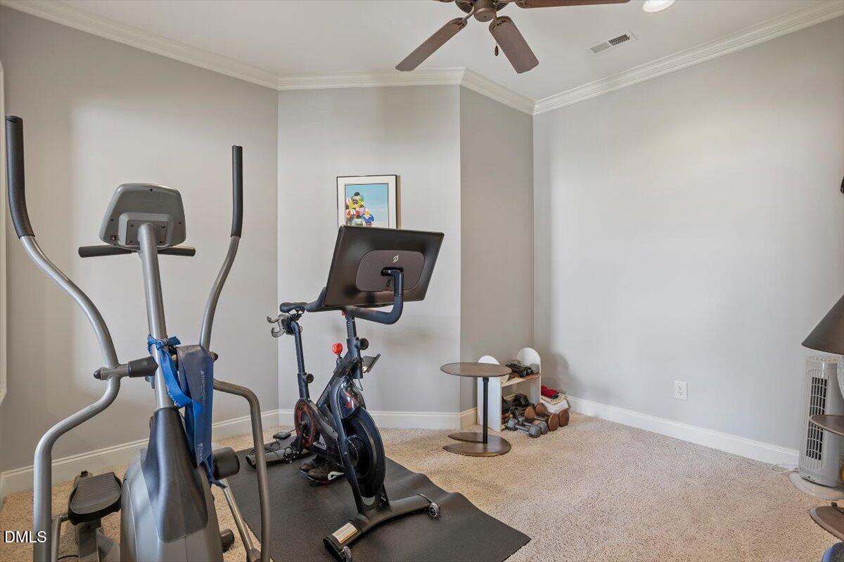 3916 Laurel Manor Court Raleigh, NC 27612 - Photo 31 of 53 a view of a room with gym equipment
