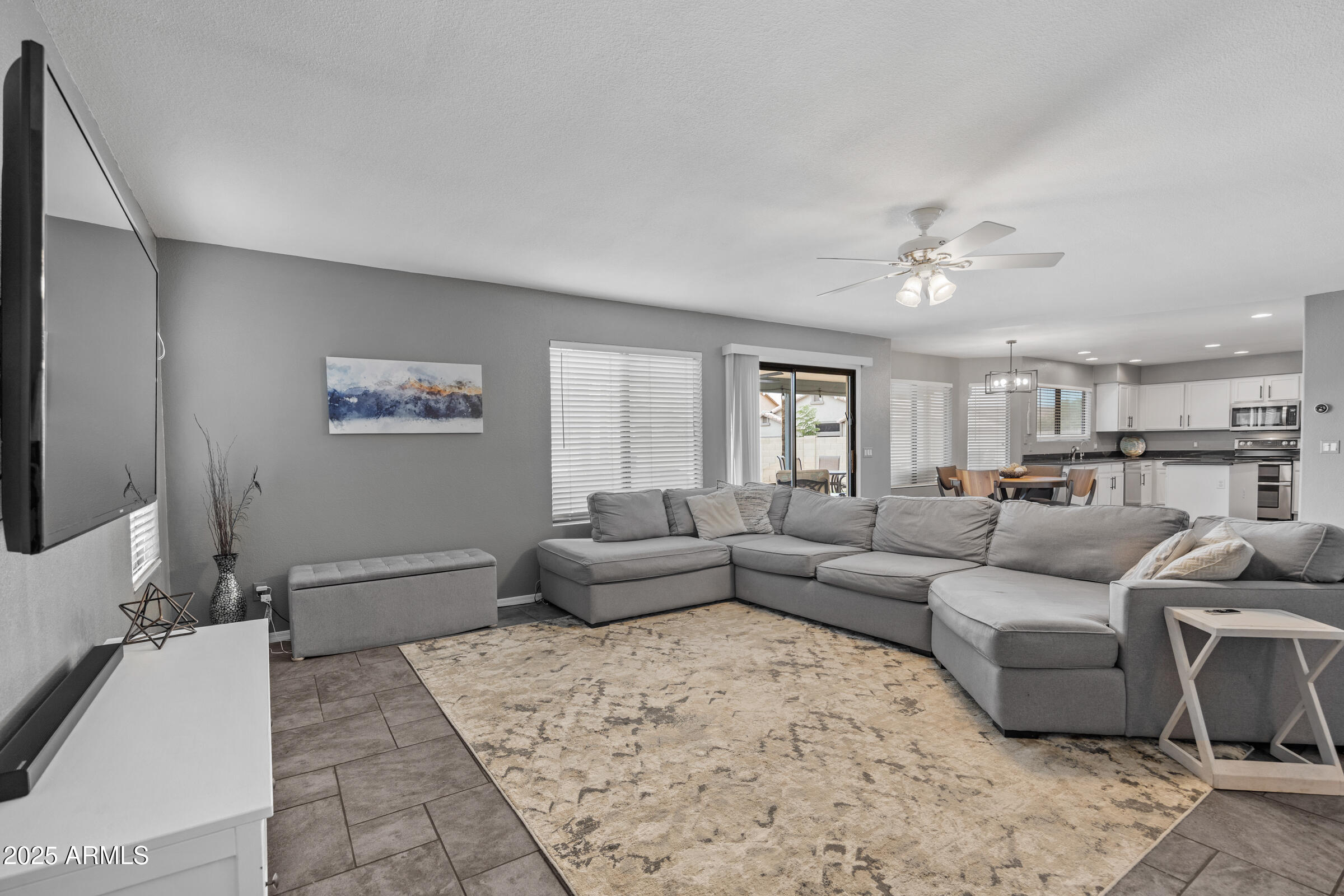 2027 East Parkside Lane Phoenix, AZ 85024 - Photo 21 of 43 a living room with furniture and a couch