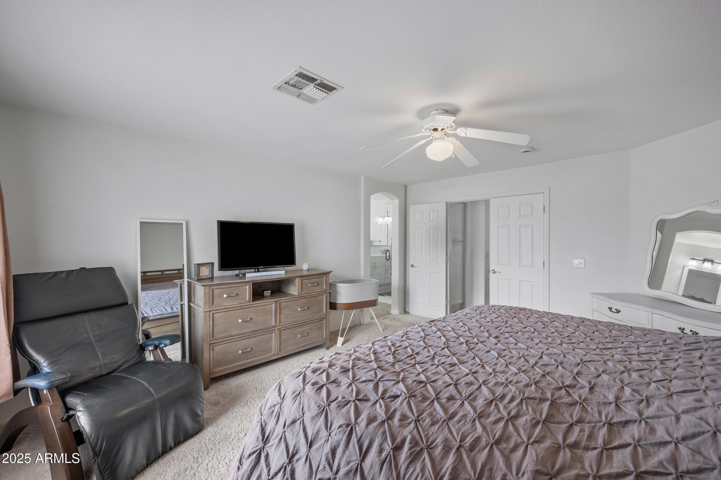 2027 East Parkside Lane Phoenix, AZ 85024 - Photo 36 of 43 a bedroom with a bed and a television