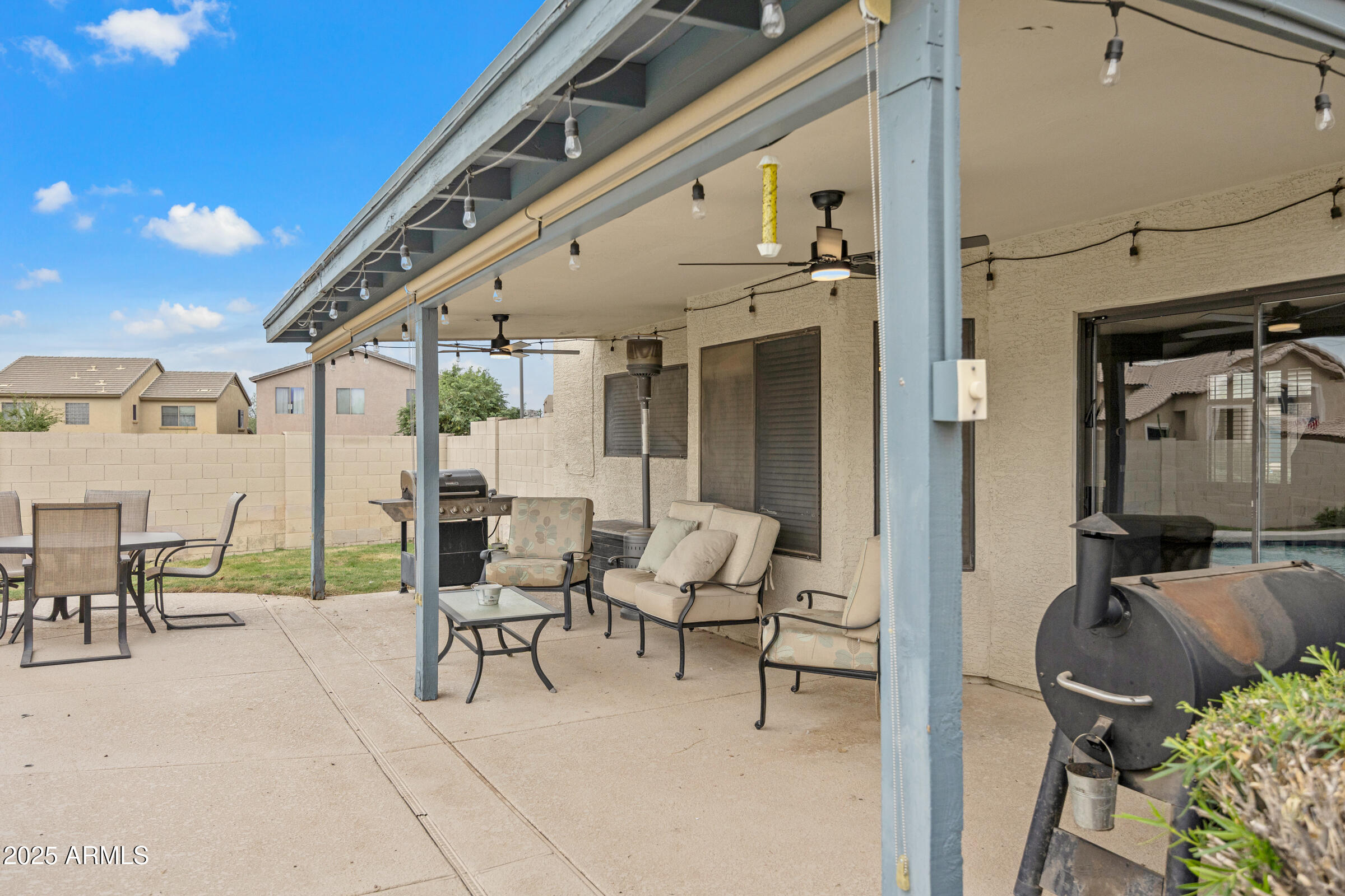 2027 East Parkside Lane Phoenix, AZ 85024 - Photo 41 of 43 a outdoor space with lots of chairs and mirrors