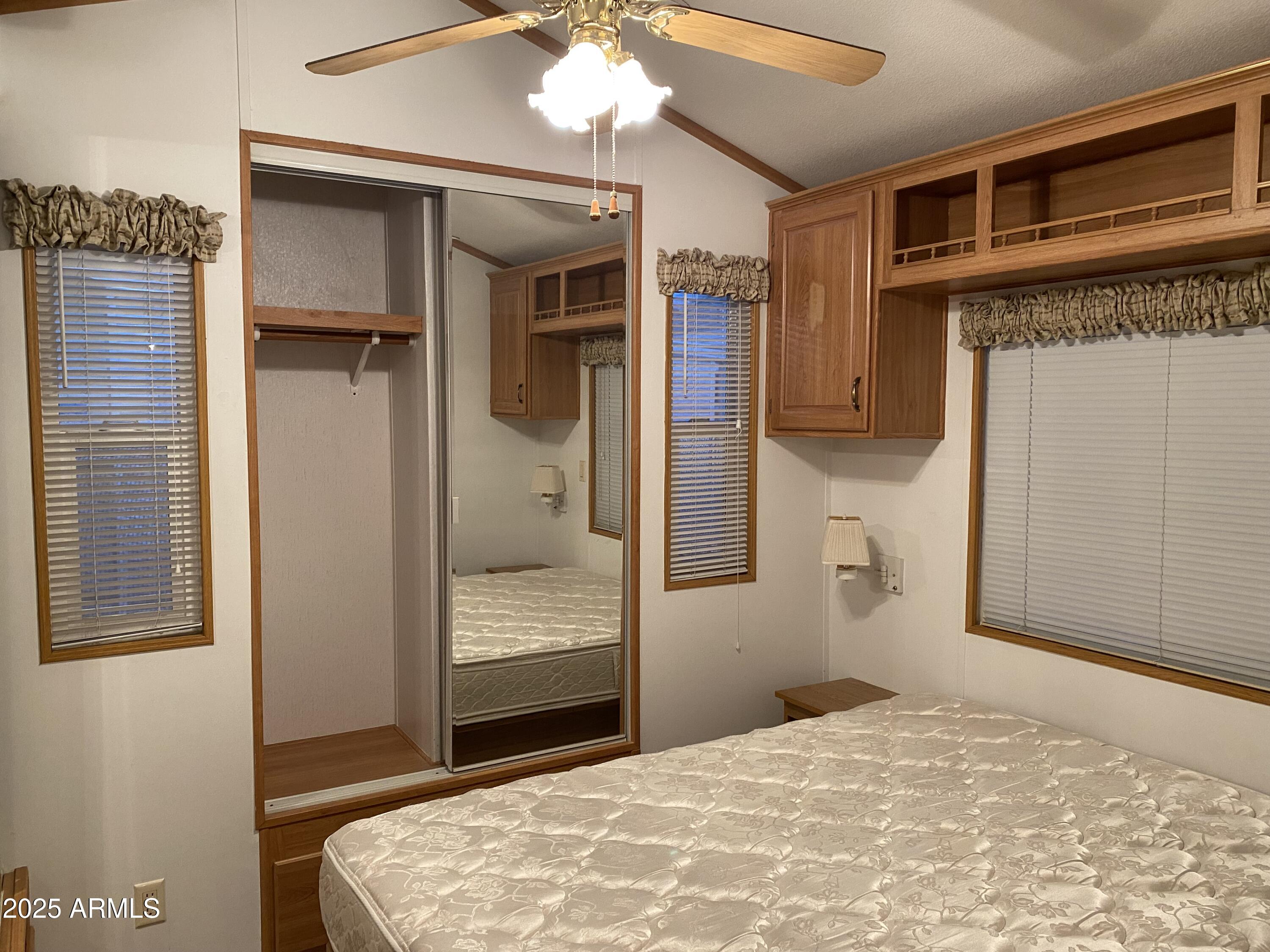 112 Kaolin Drive Apache Junction, AZ 85119 - Photo 12 of 42 a bedroom with a bed and a dresser