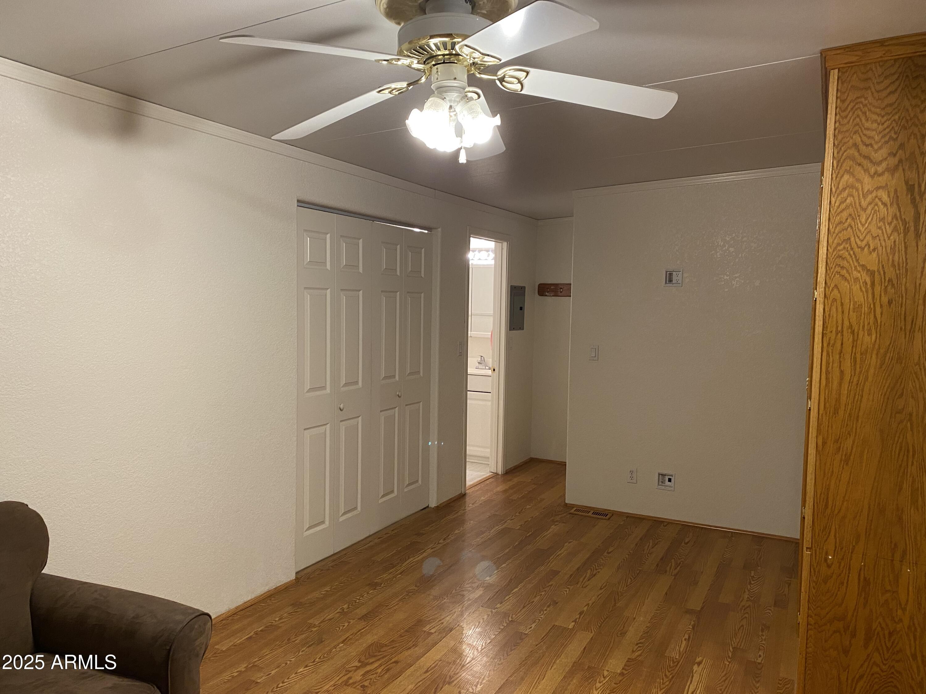 112 Kaolin Drive Apache Junction, AZ 85119 - Photo 20 of 42 a view of a livingroom with a chandelier fan