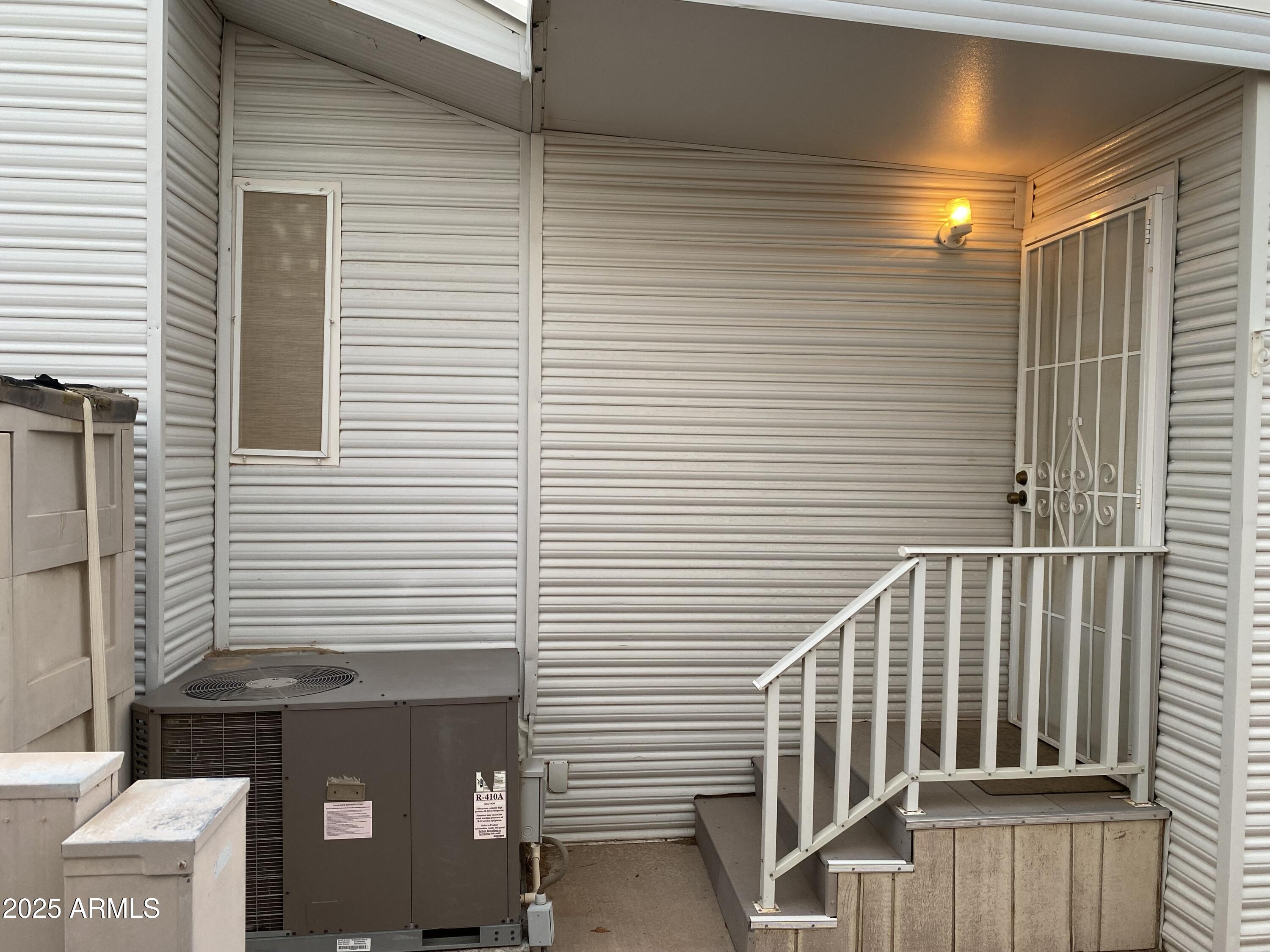 112 Kaolin Drive Apache Junction, AZ 85119 - Photo 28 of 42 a view of a balcony with door