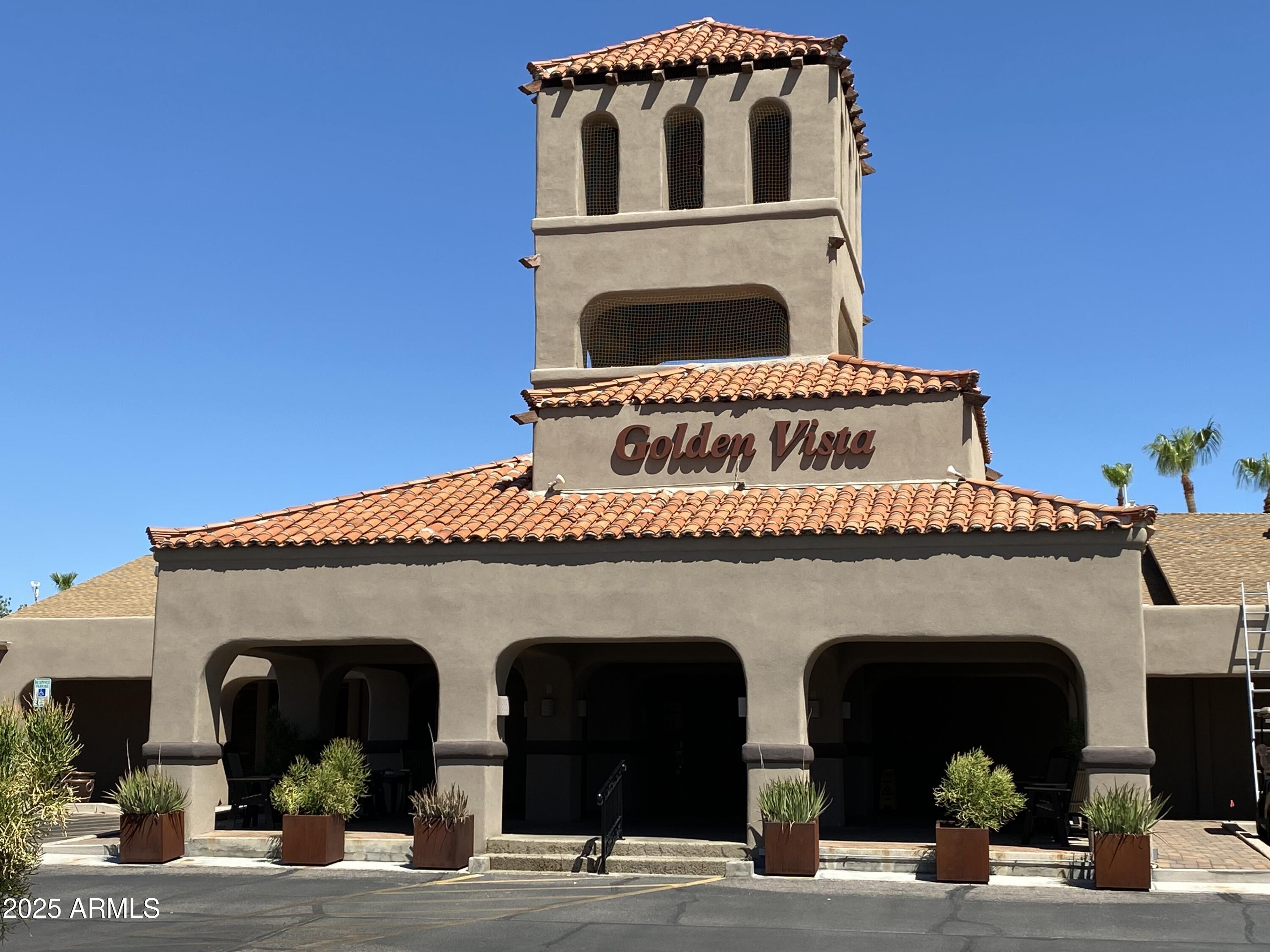 112 Kaolin Drive Apache Junction, AZ 85119 - Photo 36 of 42 a front view of a house with glass windows