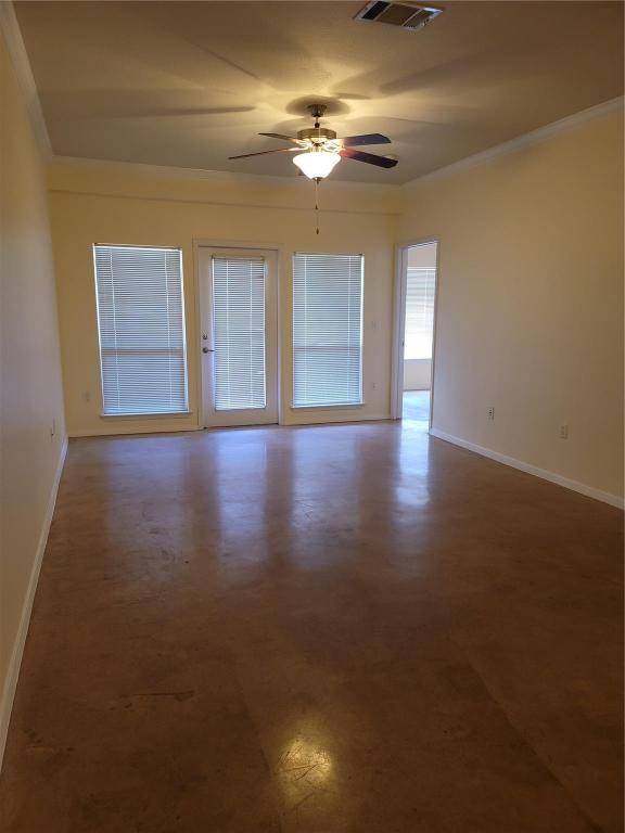 910 West 25th Street, Unit 305 Austin, TX 78705 - Photo 4 of 10 a view of an empty room with window and wooden floor