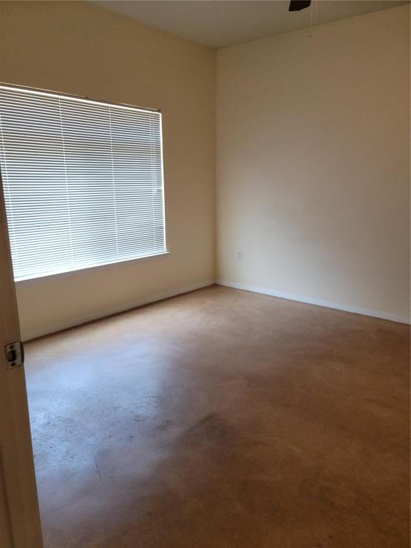 910 West 25th Street, Unit 305 Austin, TX 78705 - Photo 9 of 10 an empty room with windows