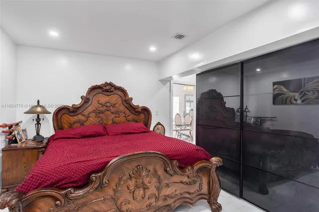 a room with a bed and closet