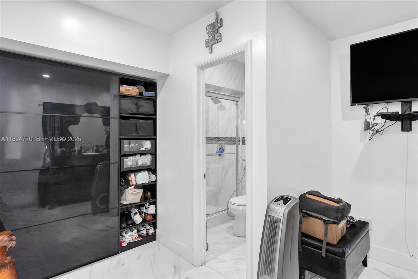 31 Southwest 58th Court Miami, FL 33144 - Photo 17 of 41 a view of a hallway with workspace and a window