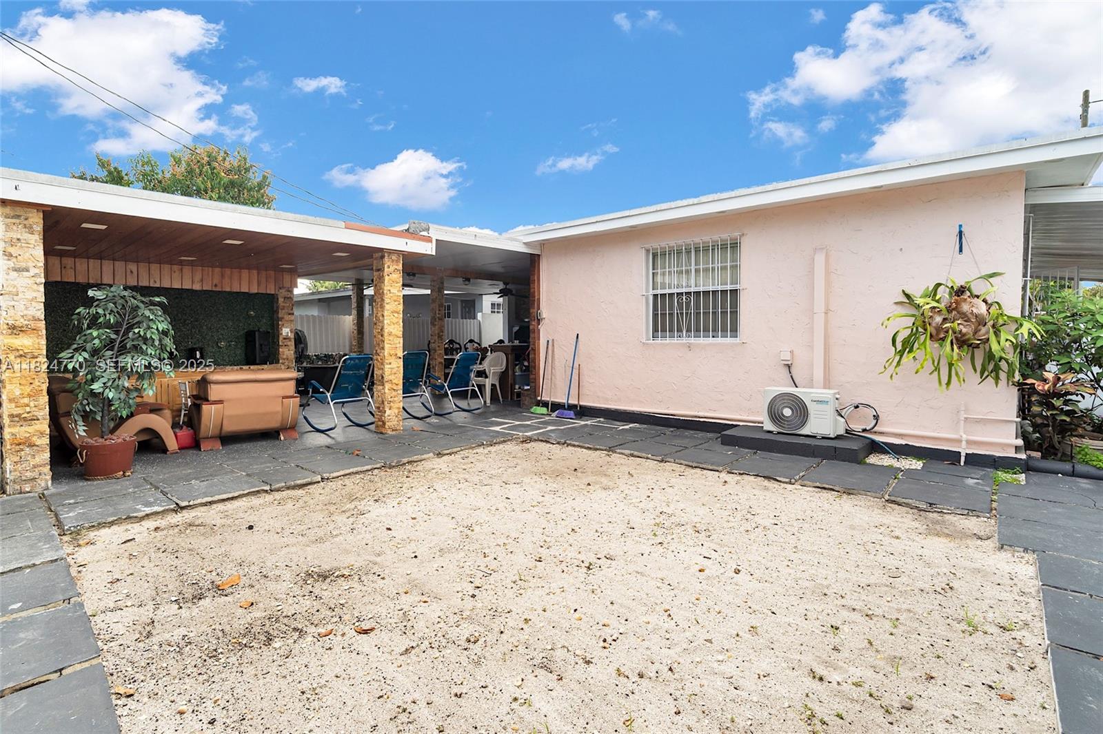 31 Southwest 58th Court Miami, FL 33144 - Photo 27 of 41 a view of a house with snow on the road