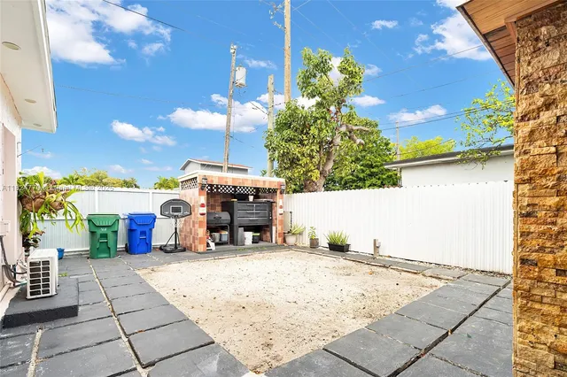 a view of a water fountain in front of house