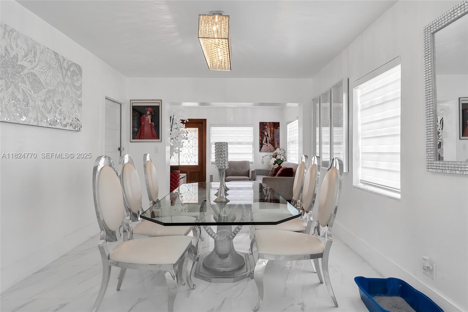 31 Southwest 58th Court Miami, FL 33144 - Photo 6 of 41 a dining room with furniture and window