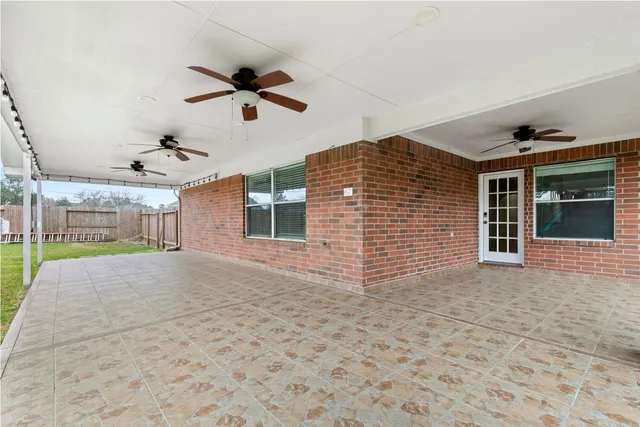 a view of a house with a yard and balcony