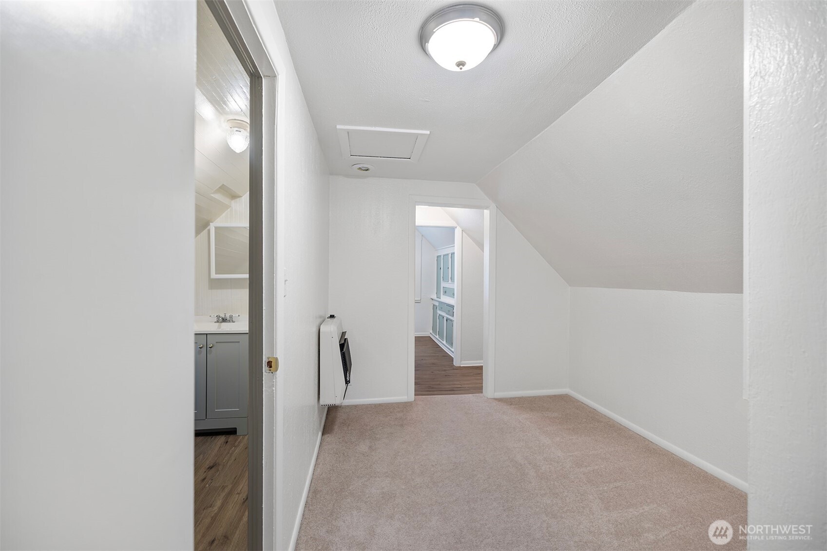 5241 South M Street, Unit AB Tacoma, WA 98408 - Photo 12 of 27 a view of a hallway with wooden shelves