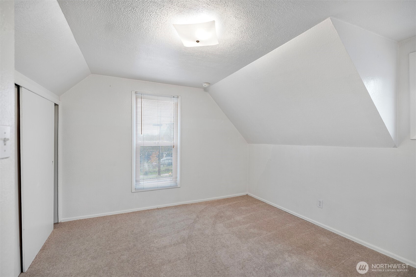 5241 South M Street, Unit AB Tacoma, WA 98408 - Photo 19 of 27 an empty room with windows