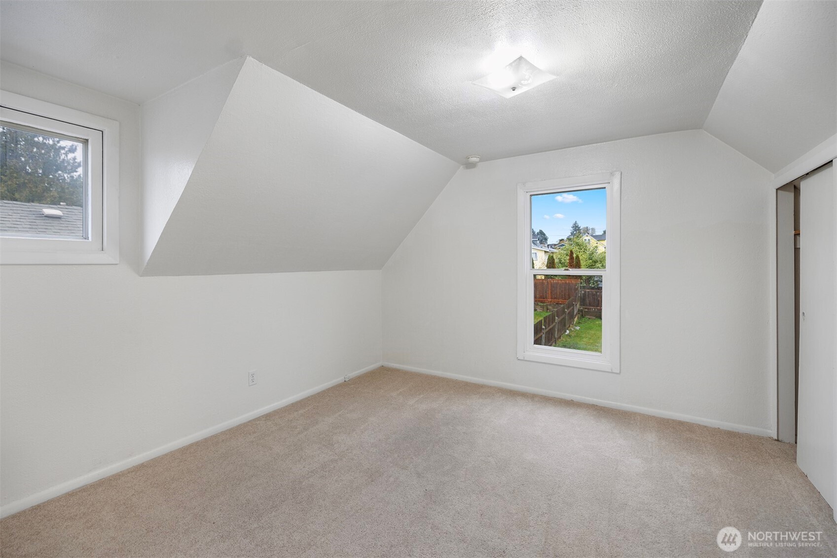 5241 South M Street, Unit AB Tacoma, WA 98408 - Photo 20 of 27 an empty room with windows
